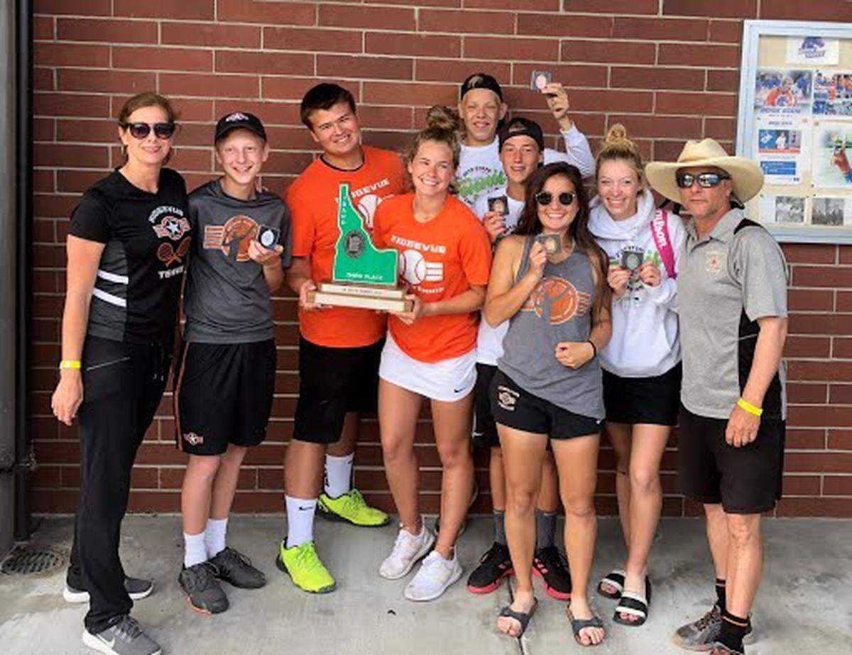 Krista Kingston (far left) with Traejen and Kai Johnson (5th and 6th from left), who placed 4th in boys doubles at the 2019 4A State Tennis tournament. Traejen’s younger brother, Brevin, is 2nd from left.