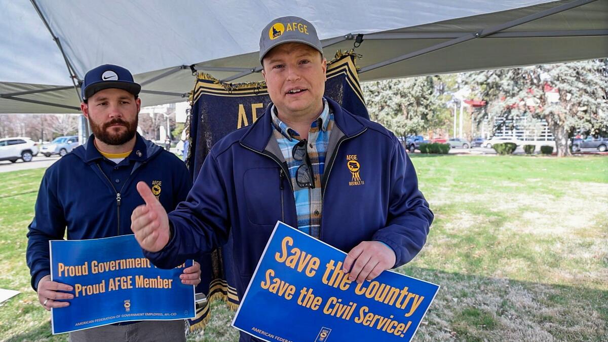 “They’re trying to privatize the VA,” said Chandler Bursey, right, president of Local 1273 of the American Federation of Government Employees, which represents Veterans Affairs employees in Boise. At left is AFGE Local 1127 Vice President Cameron Cochems, who represents Transportation Security Administration workers whose collective-bargaining agreements were also ended by the Trump administration.