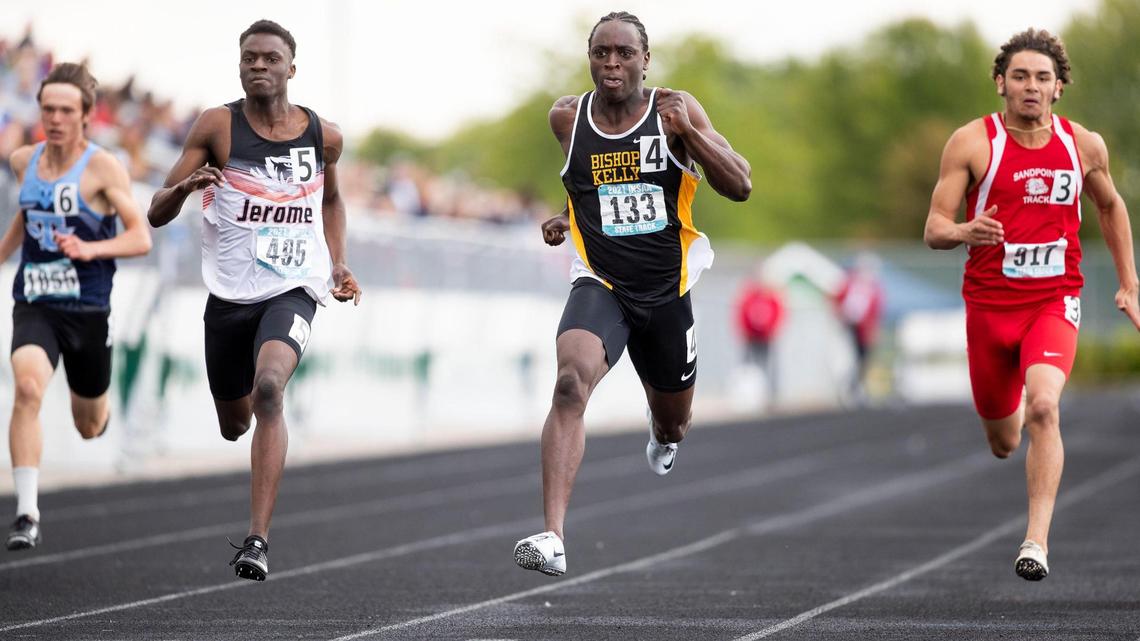 James Onanubosi, Bishop Kelly, sets a new 4A 100-meter class record at 10.69 at the state track finals Saturday, May 22, 2021, at Eagle High School. Jerome’s Taeo Schneider finished second and Sandpoint’s Braden Happen was third.