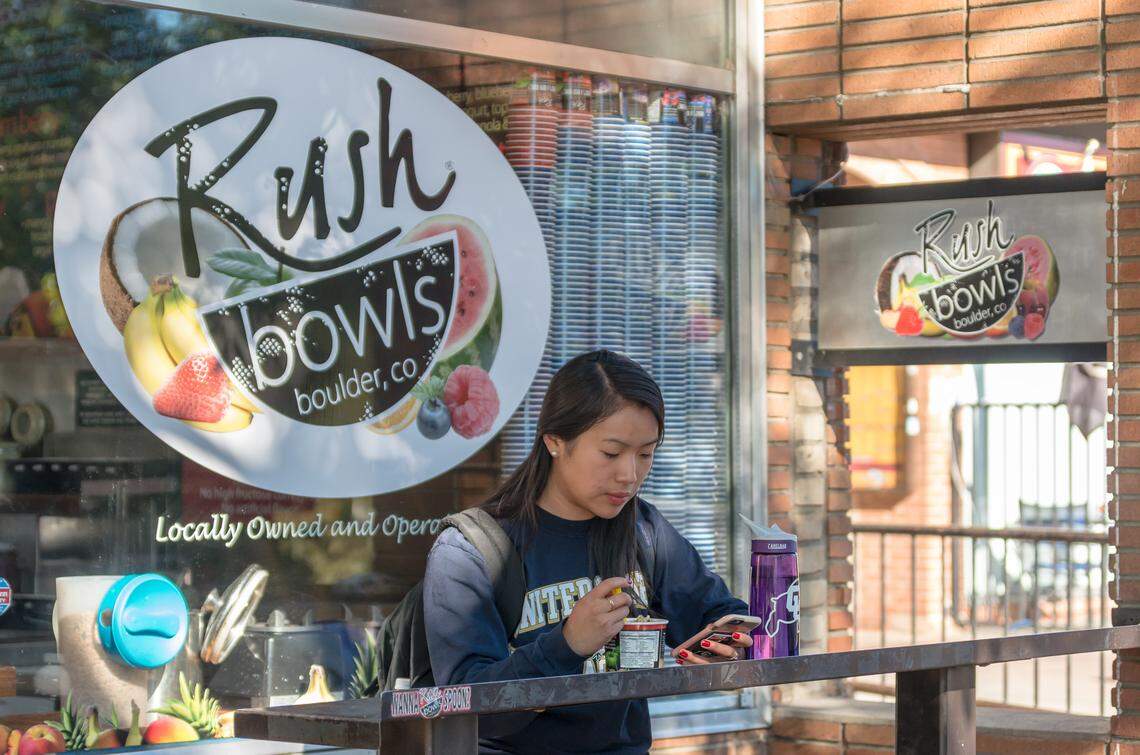 A customer eats at a Rush Bowls in Boulder, Colorado.
