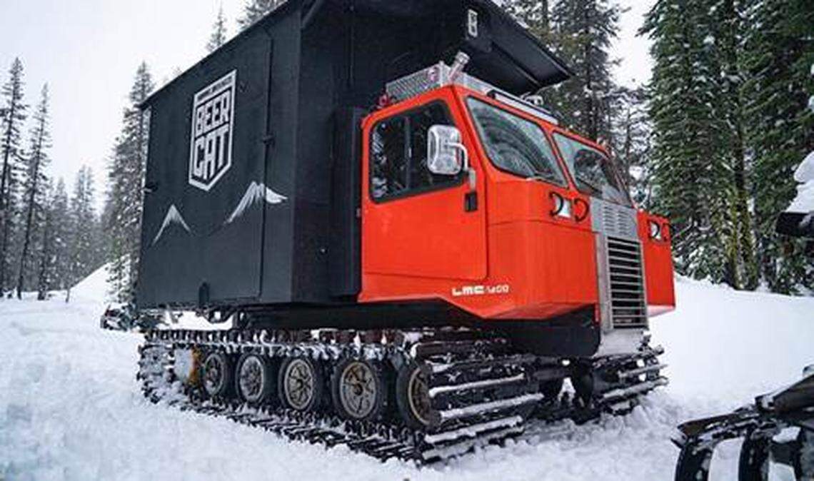 The sides and back open up, and a tap handle magically appears in the 10 Barrel Brewing Co. Beer Cat.