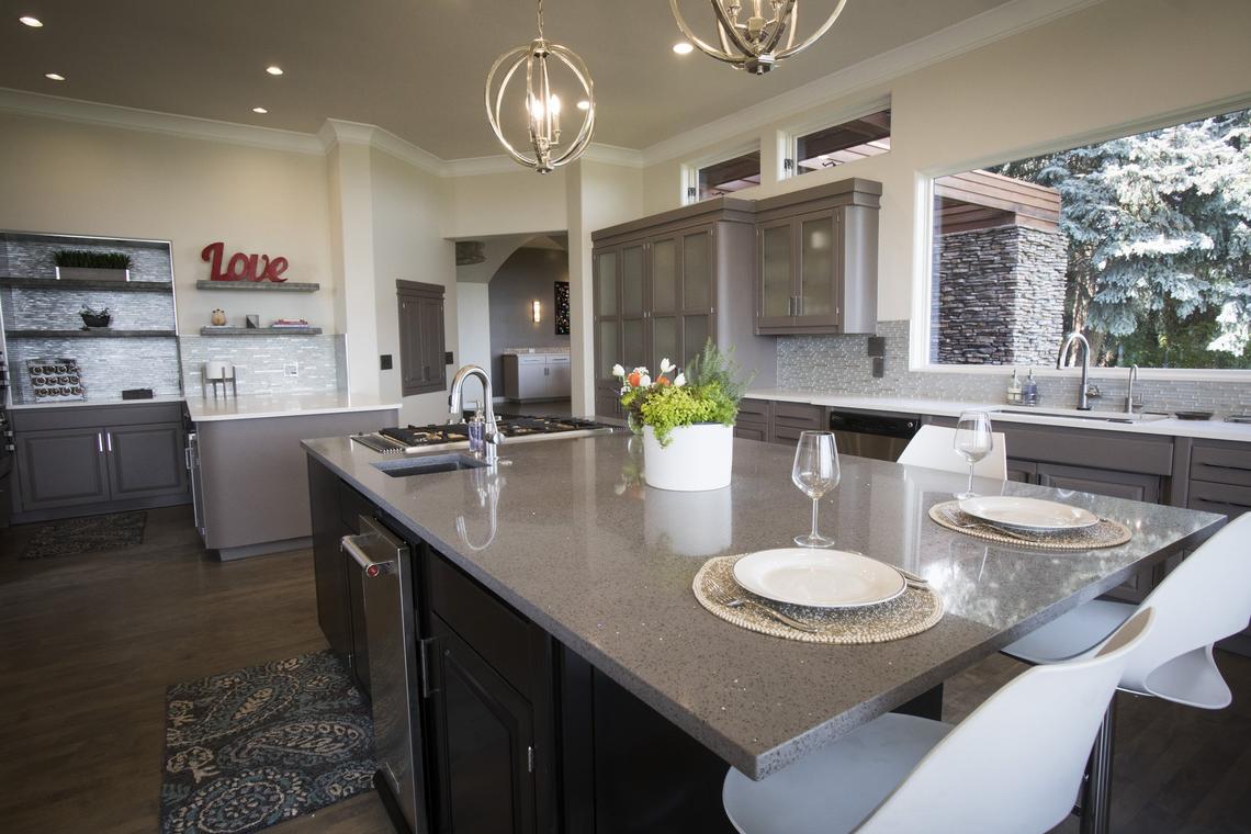 The Wendlandts used the “bones” of the original kitchen to bring it in line with their vision. Fresh paint on the cabinets and a new center island and quartz countertops, and the space was transformed..