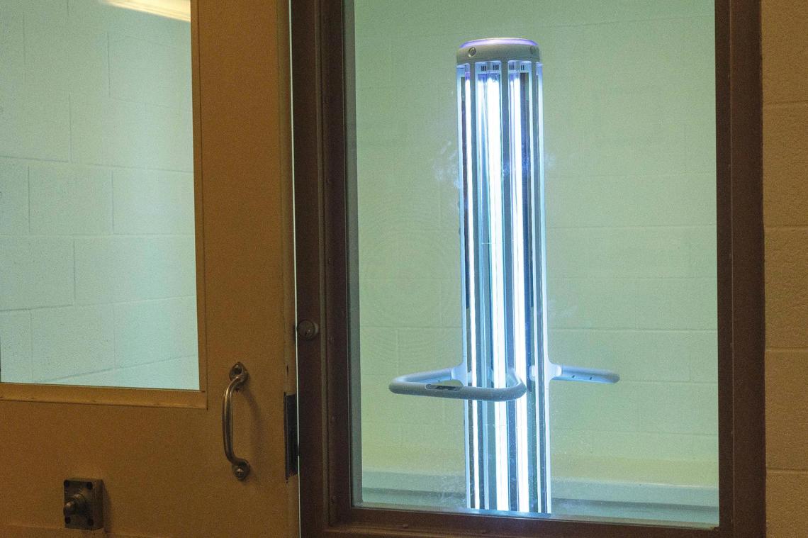 The R-Zero Arc machine uses ultraviolet light to kill pathogens inside of a holding area in the booking section of the Elmore County Jail in Mountain Home.
