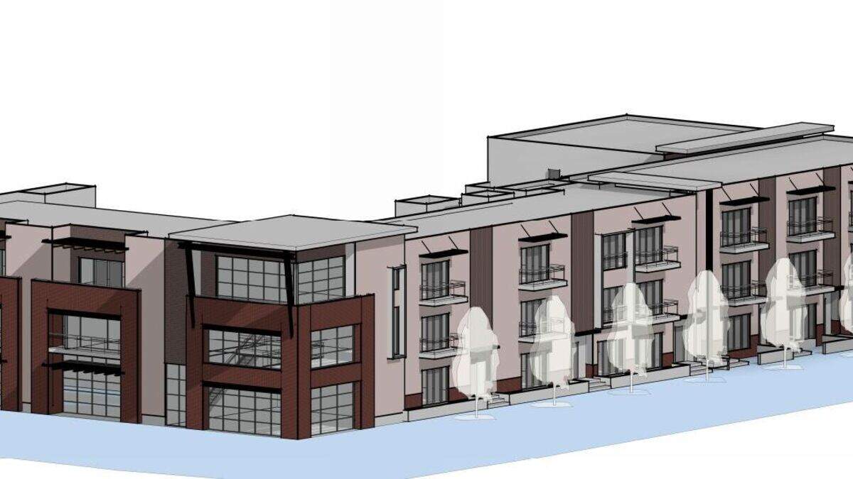 Instead of a four-story commercial-residential building next to several townhomes, developers Jeanette Newbold and Michael Jobes are now considering a single three-story building with ground-floor commercial space and 31 condominiums or apartments.