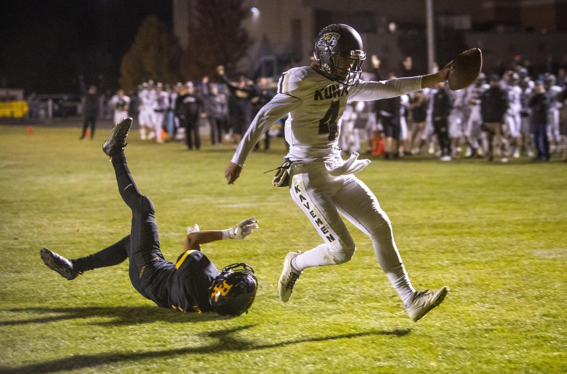Kuna quarterback Sean Austin easily runs into the end zone for a 9-yard touchdown Friday in the Kavemen’s 48-6 win over Bishop Kelly.