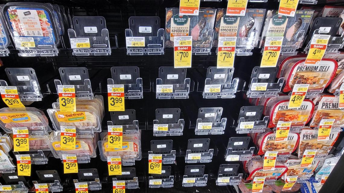 Several facings of packaged lunch meats were empty Tuesday at the Albertsons store at 36th and State streets in Boise.