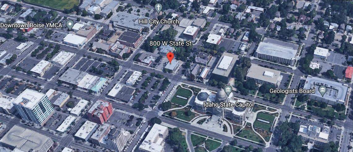The building at 800 W. State St. is diagonal from the state Capitol and in a prime location on the northwest corner of 8th and State streets. A new proposal calls for a six-story building combining a restaurant, retail, offices and residential uses.