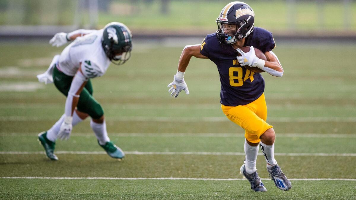 Meridian wide receiver Tyson Acree breaks free from an Eagle defender for a touchdown last week at Meridian High.