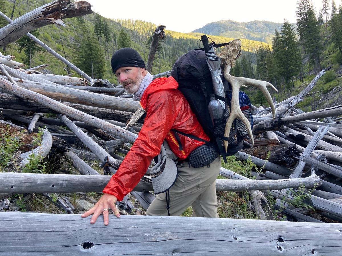 Jeremy Johnson carries a “deadhead” deer skull while hiking the Idaho Centennial Trail. He picked it up in Marble Creek to give as a gift at Campbell’s Ferry. “He carried it for about 50 or 60 miles including through this avalanche field in Monumental Creek,” his wife, Lisa, said.