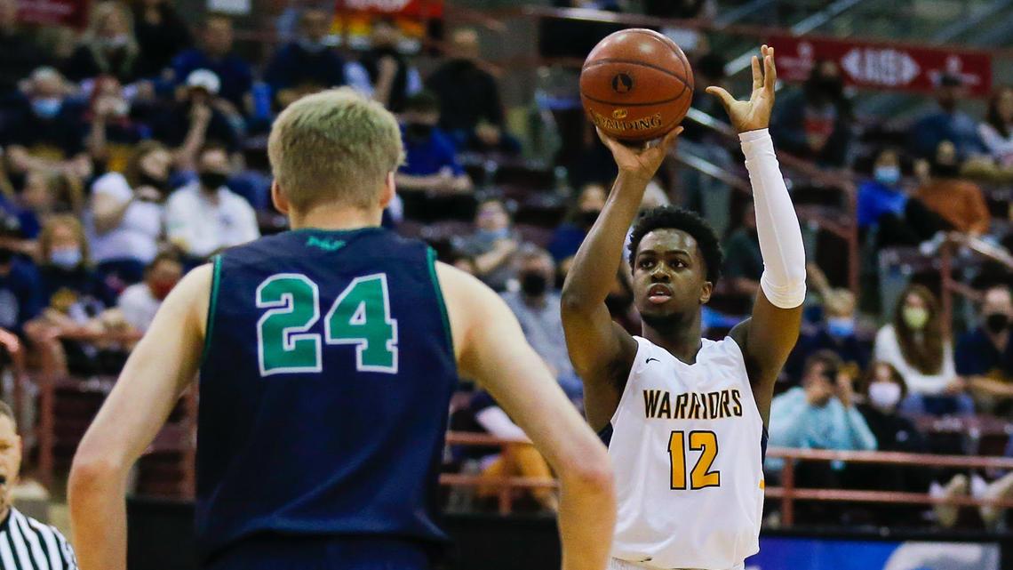Meridian’s Joe Mpoyo shoots a 3-pointer in the Warriors’ first-round win over Mountain View at the 5A boys basketball state tournament Thursday at the Ford Idaho Center.