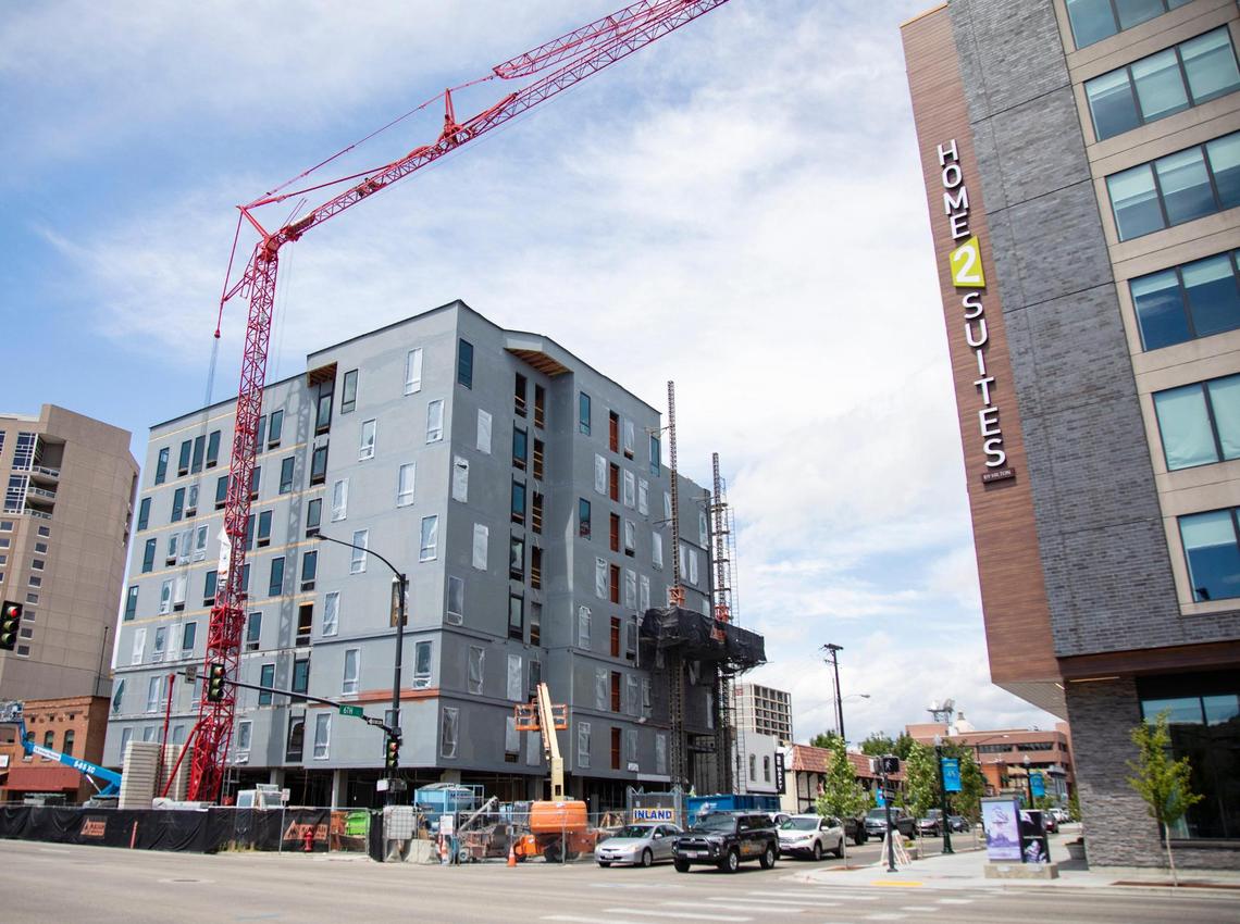 A building goes up on Front Street in Boise. To address growth, some Boise developers say Idaho’s local governments need their own sales taxes.