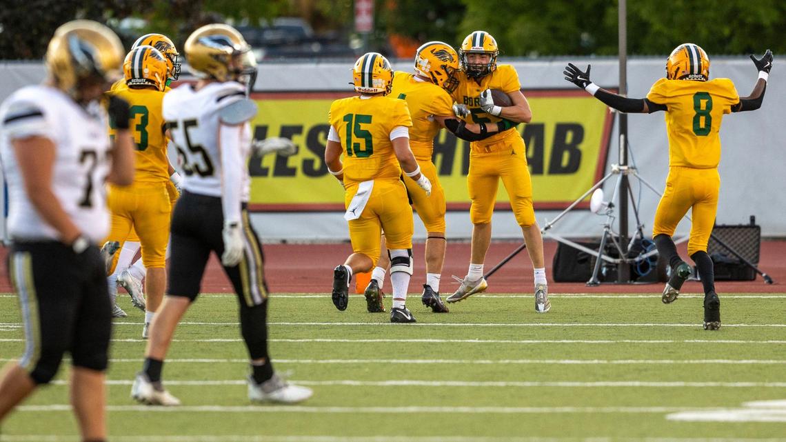 Borah linebacker Colton Poste celebrates his pick-six in the first half against Capital in a 6A SIC football game at Dona Larsen Park in Boise.