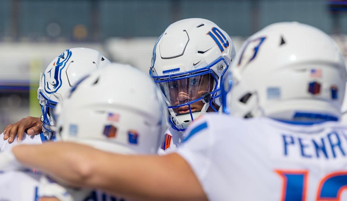 Boise State quarterback Taylen Green (10) huddles before entering the field to warm up for the start of the game against Washington at Husky Stadium in Seattle, Saturday, Sept. 2, 2023.