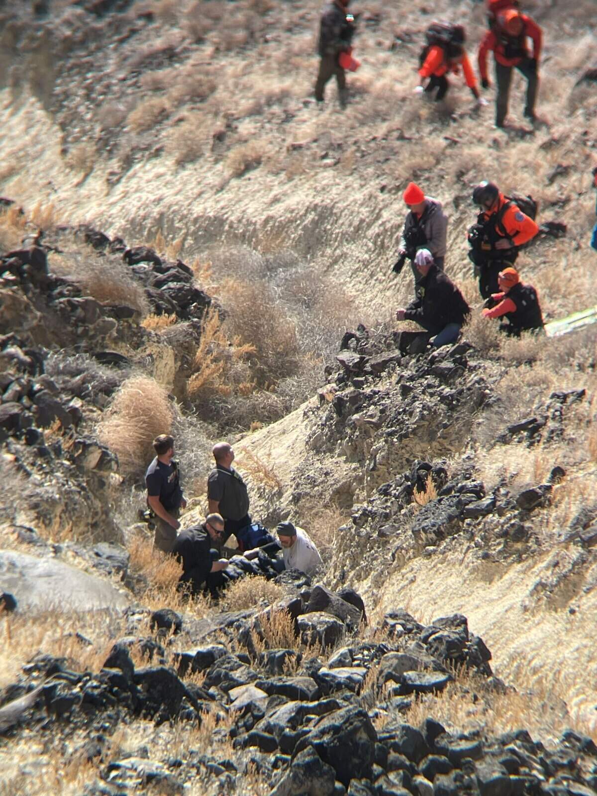 Rescuers work to get Penny Clark to safety.