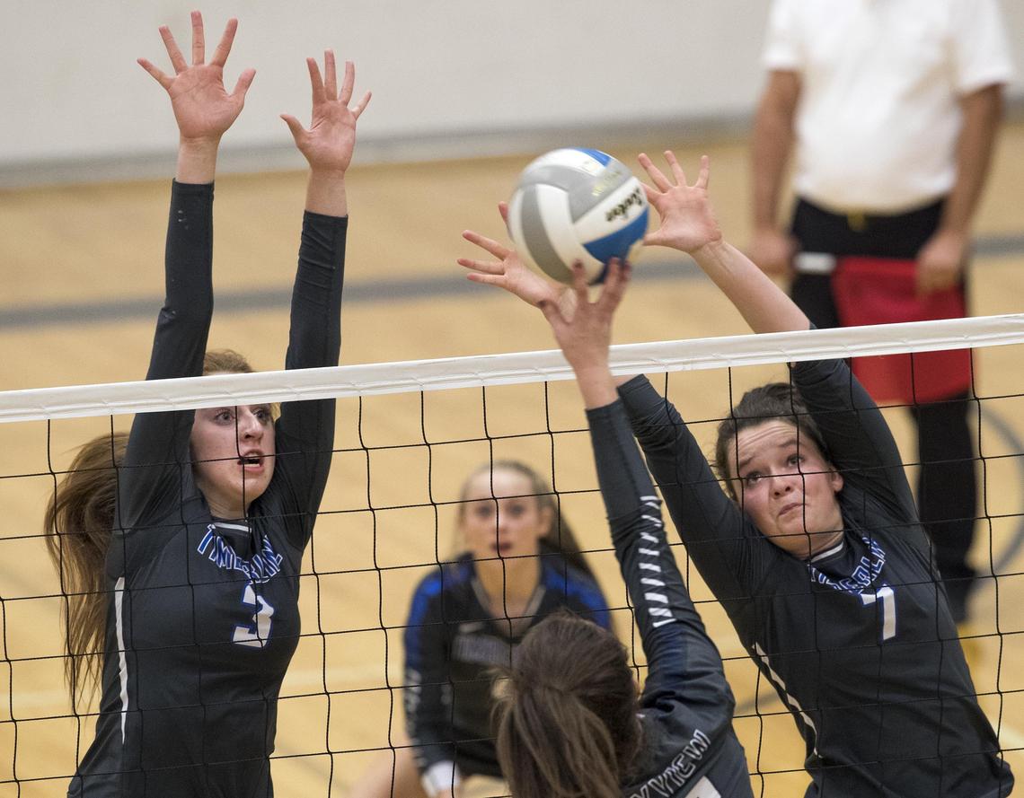 Timberline senior Miranda Lamb, right, was one of four Wolves elected to the 5A all-state volleyball team.