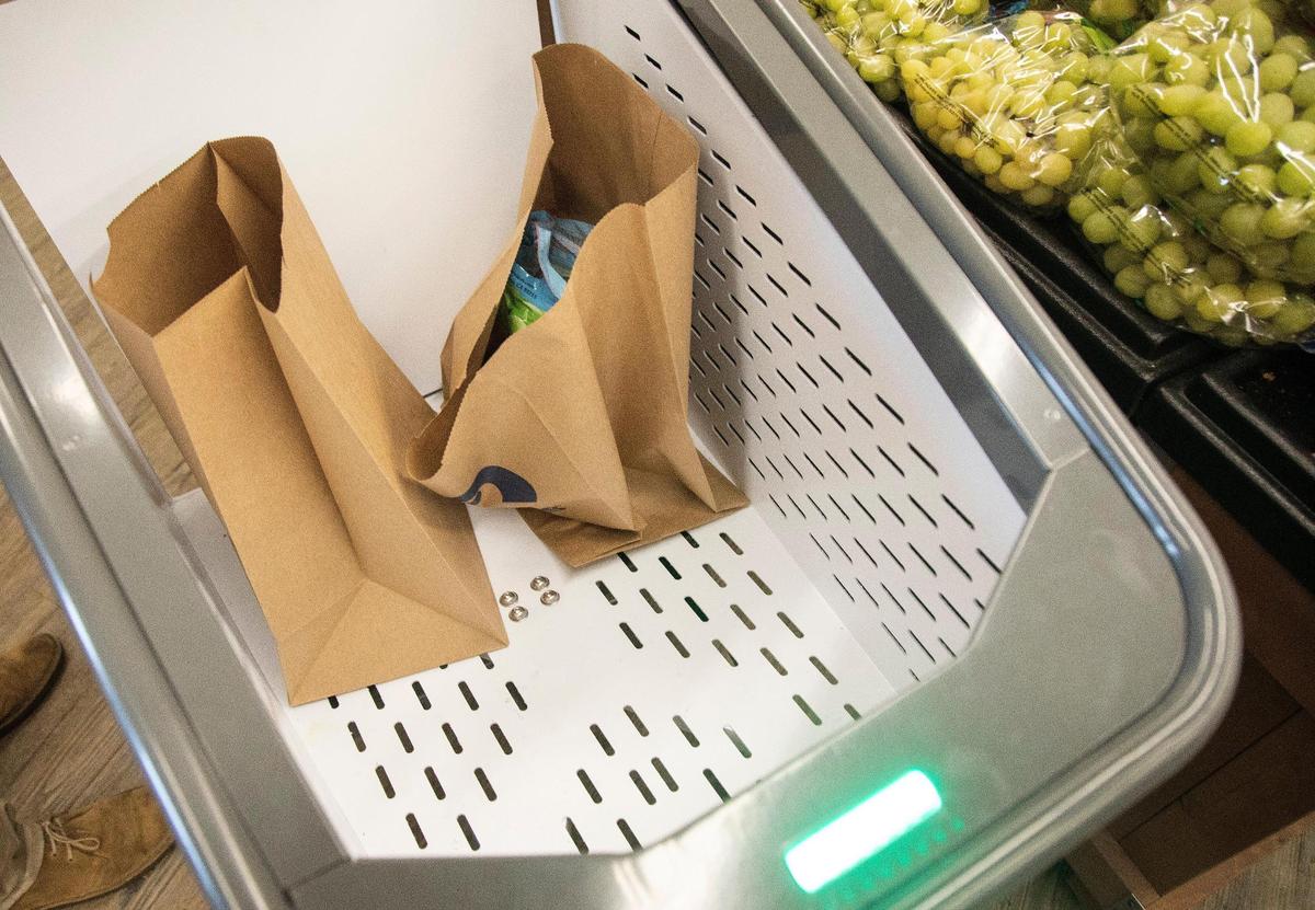 The Veeve shopping cart uses computer technology to allow customers to scan item barcodes, weigh produce in basket, and use contactless payment straight from the grocery cart.