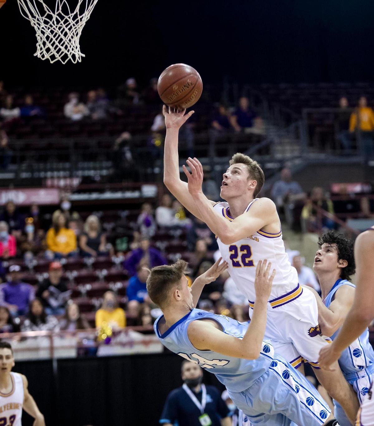 Garden Valley guard Josh Gillespie shoots on a drive over Dietrich’s Layne Dilworth in the 1A Division II boys basketball state championship Friday.