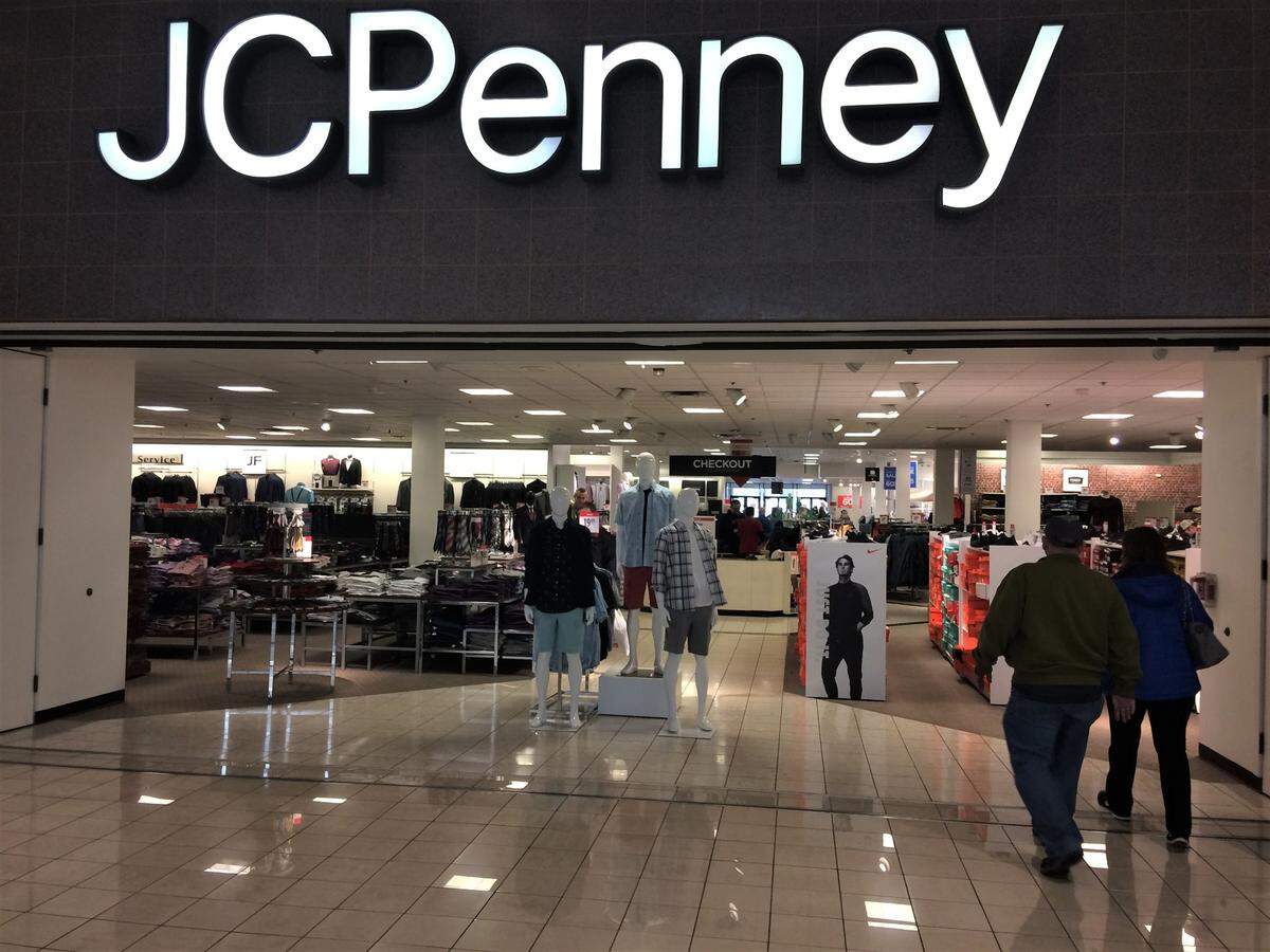 A couple approach the J.C. Penney store at Boise Towne Square mall. The mall’s owner, New York City-based Brookfield Properties, and the Simon Property Group, another national mall owner, have agreed to buy the struggling retail chain, which is in bankruptcy.
