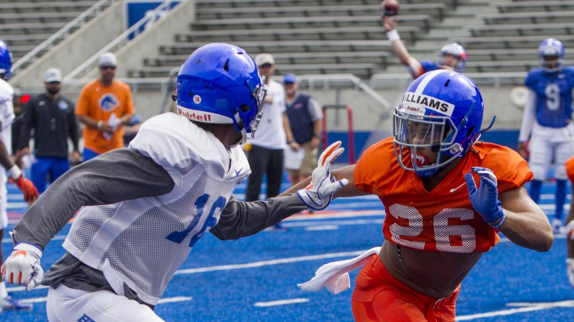Boise State cornerback Avery Williams goes one-on-one with receiver John Hightower during the Broncos’ first practice in full pads Wednesday, Aug. 7, 2019 at Albertsons Stadium.