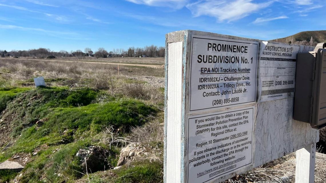 A public notice sign is posted at a phase of the Prominence development site on the southwest corner of West Hill Parkway and Bogart Lane.