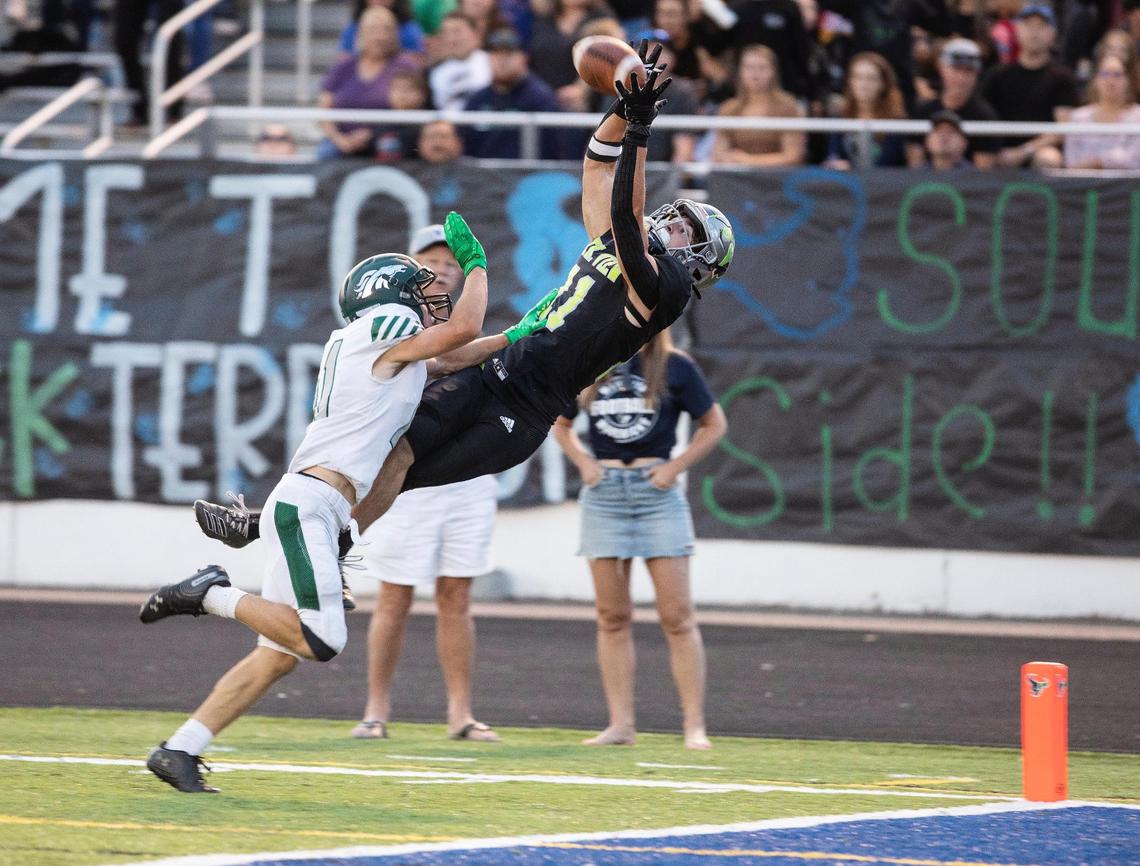 Eagle’s Tristan Walker can’t stop a diving, 20-yard touchdown catch by Mountain View wide receiver Dominic Sotomayer in the second quarter Friday.