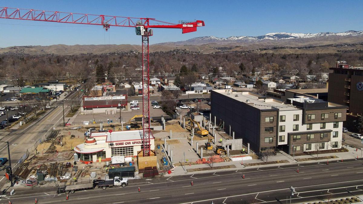New Path 2.0 is under construction next to the first New Path building, which opened in 2018 providing housing in an effort to stem chronic homelessness.