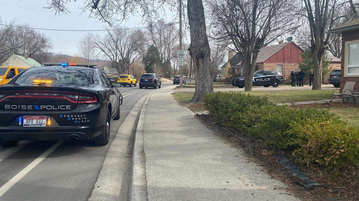 More than 10 police cars were present near Garfield Elementary School after it was briefly placed on lockdown Thursday. Police said a male suspect was taken into custody near Leadville and Boise avenues after fleeing a traffic stop into a nearby neighborhood. 