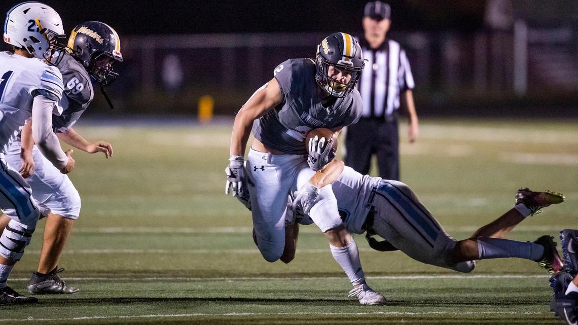 Meridian running back Kross Antonnacchi runs into the red zone before being tackled by Skyview’s TerRyek Pennington on Friday at Meridian High.