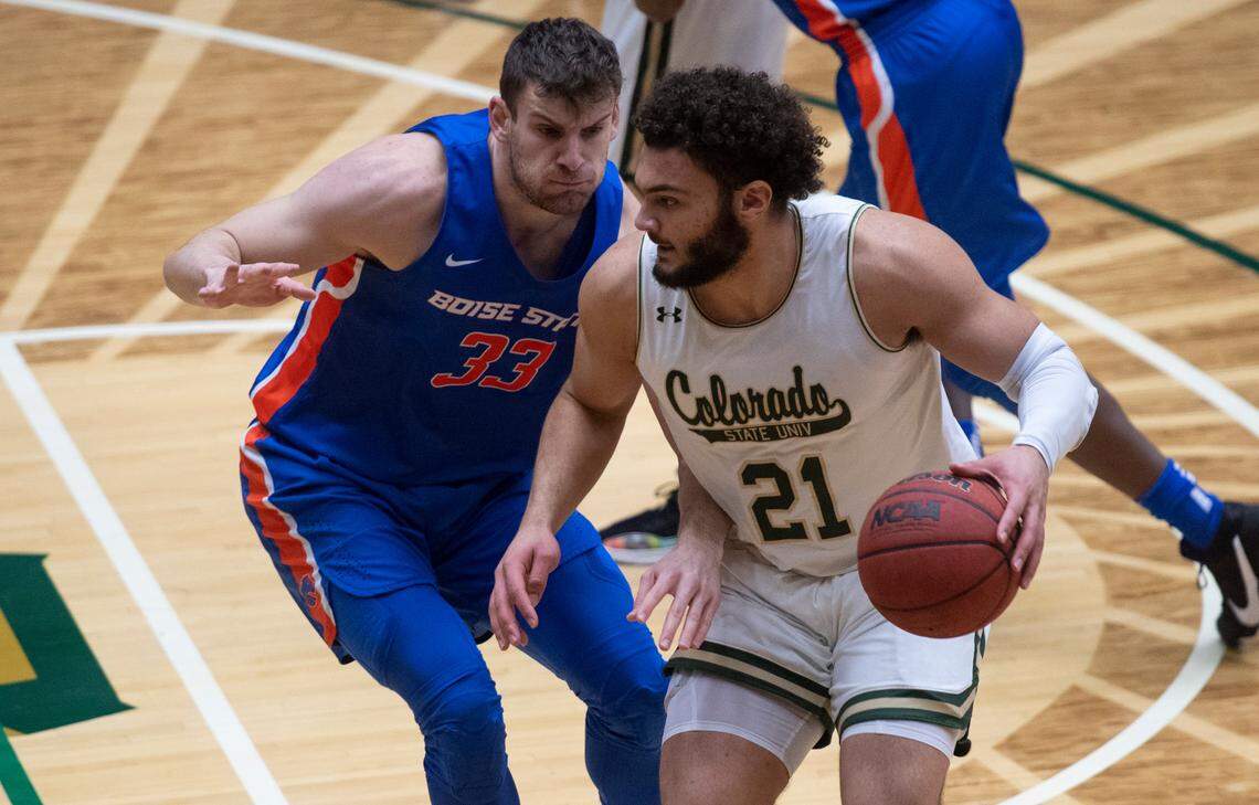 Colorado State’s David Roddy, right, goes up against Boise State’s Mladen Armus last season. The Rams are 10-0 and ranked No. 20 in the latest AP Top 25 heading into Mountain West play.