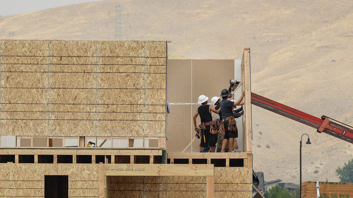 Developers have applied to build more than 170 houses in three Treasure Valley subdivisions, and a nonprofit developer just broke ground on one subdivision with 39 “pocket neighborhood” houses in Boise. Construction crews work on new homes in Boise’s Harris Ranch.