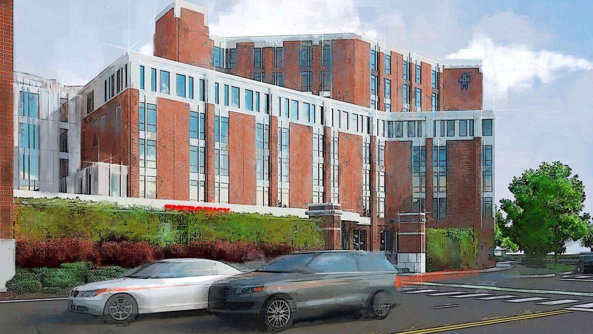 An architect’s view of a new ambulance entrance in the foreground, with a new patient tower behind it, planned for the latest expansion of the St. Luke’s Boise Medical Center. This view is from the intersection of Jefferson Street and Avenue B and looks northwest.