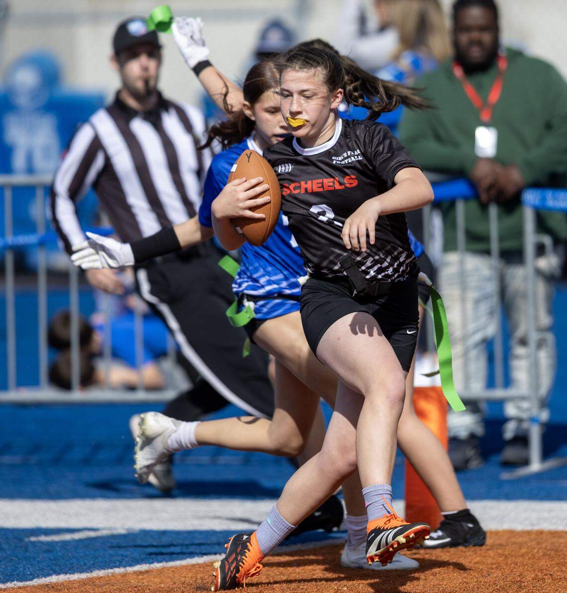 Girls on the Rocky Mountain flag football team play and exhibition game on the Blue turf of Albertsons Stadium organized by Optimist Youth Football at the end of the Broncos' annual spring game, Saturday, April 25, 2026.