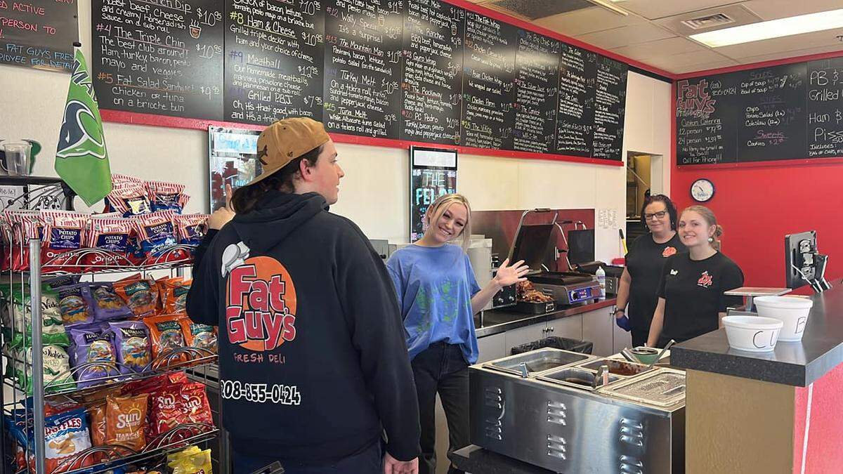 Employees at Fat Guy’s in Meridian prepare for a shift of hungry customers.