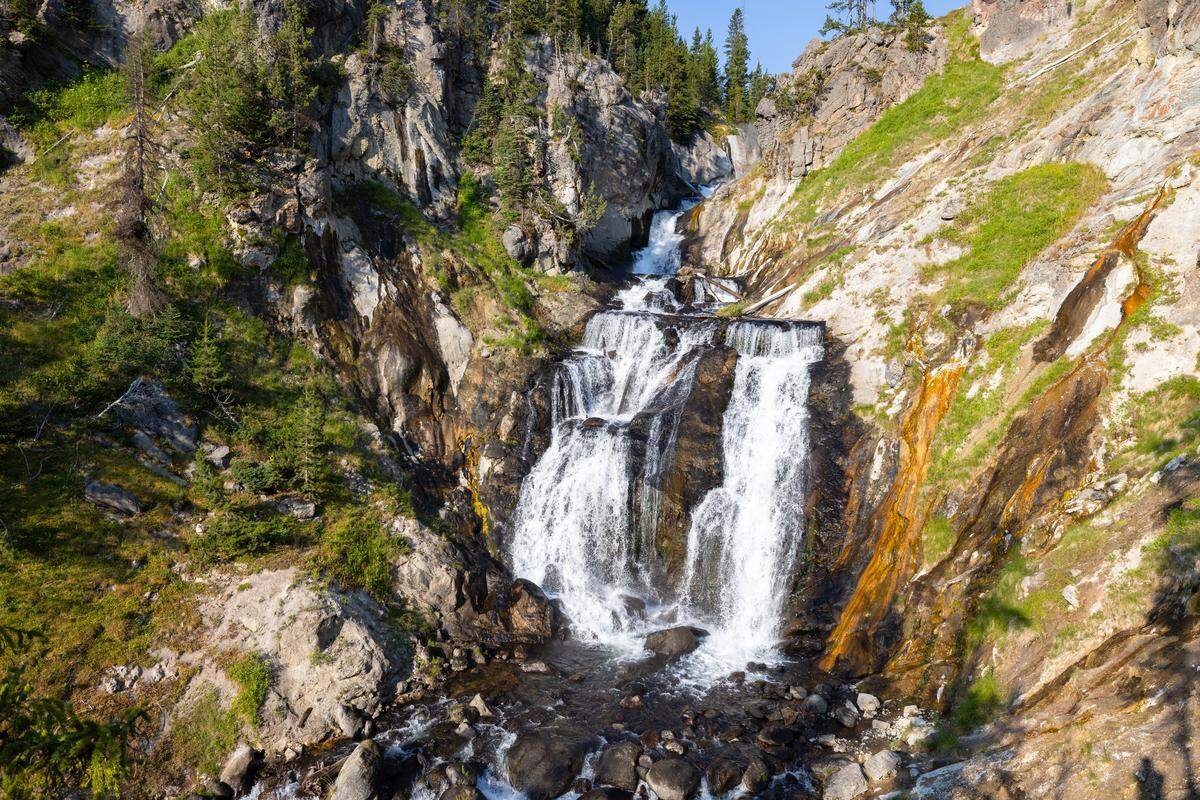 A 70-foot waterfall on the Little Firehole River is the main attraction of the Mystic Falls Trail at Yellowstone National Park. Two hikers were injured by a bear or bears while hiking the trail on Monday.