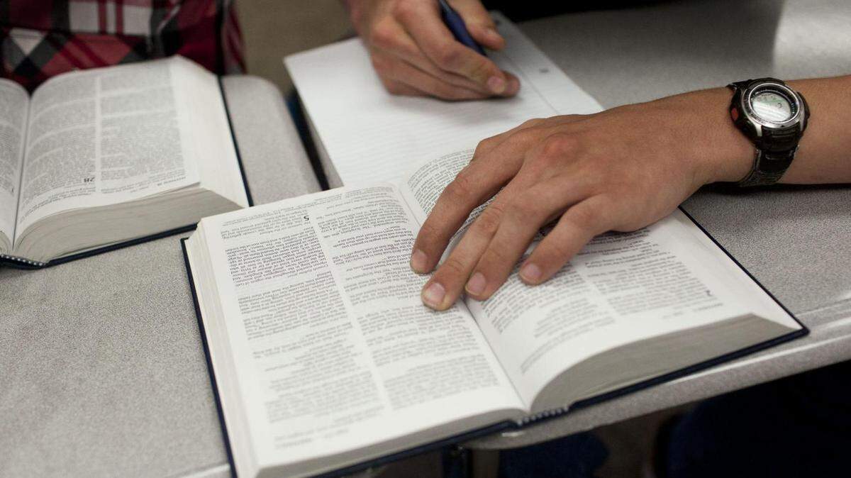 Students study the Bible during class at the Minidoka Christian Education Association on March 10, 2015, in Burley.