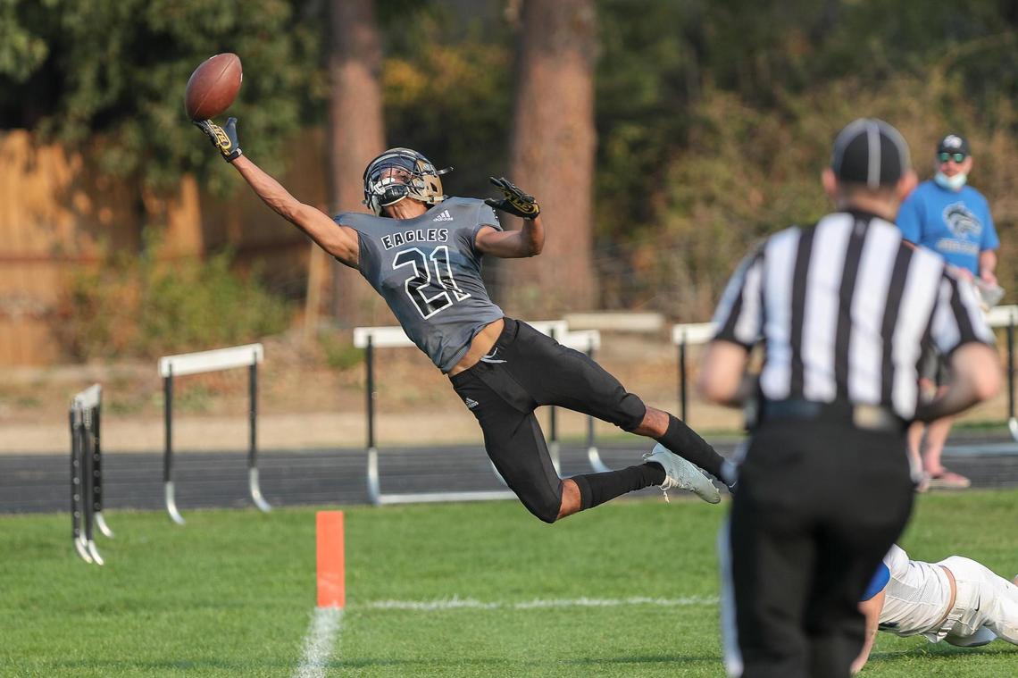 Capital receiver Ethan Castillo lays out for a pass deep in the end zone against Timberline on Friday, Oct. 9, 2020, at Capital High School.