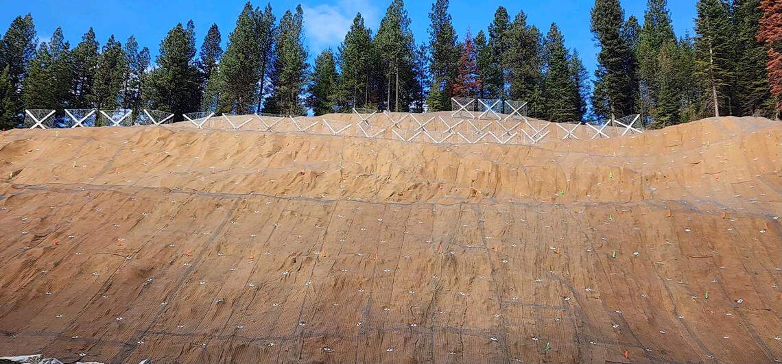 Installation of snow fencing on a troublesome hillside was one of the finishing touches to complete the overdue Idaho 55 highway project that wrapped up in December 2023.