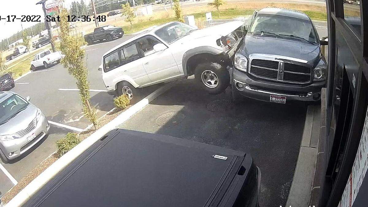 A surveillance video image shows part of the incident at a drive-thru Saturday in Hayden, Idaho.