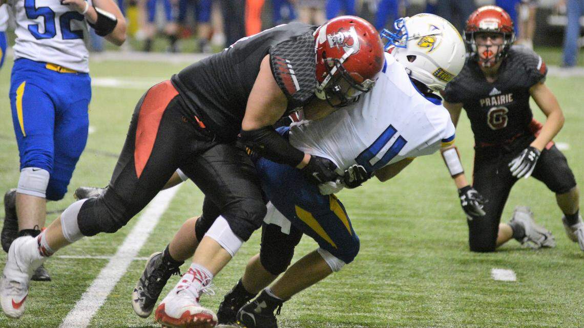 Prairie’s Dean Johnson, left, was voted the 1A Division I All-Idaho Football Player of the Year by the state’s coaches.