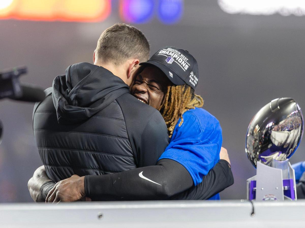 Boise State football head coach Spencer Danielson and Boise State running back Ashton Jeanty, whom Danielson baptized in summer 2024.