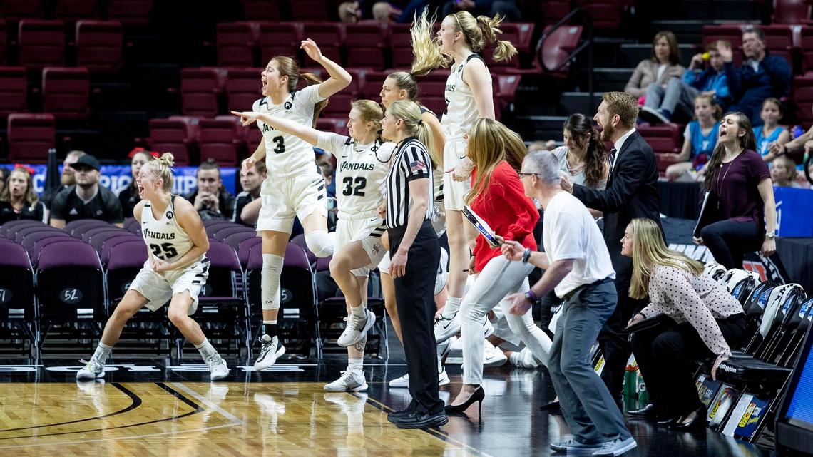 Idaho’s bench celebrates a score by Natalie Klinker plus a foul near the close of the fourth quarter. The Vandals rallied in the second half to defeat Portland State 56-54 in the Big Sky women’s basketball tournament Tuesday at CenturyLink Arena in downtown Boise.