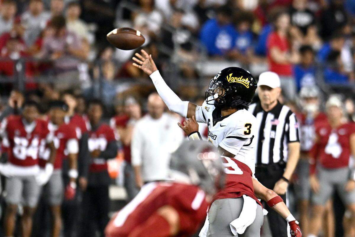 Aug 30, 2025; Pullman, Washington, USA; Idaho Vandals quarterback Joshua Wood (3) throws a pass against the Washington State Cougars in the first half at Gesa Field at Martin Stadium. Mandatory Credit: James Snook-Imagn Images