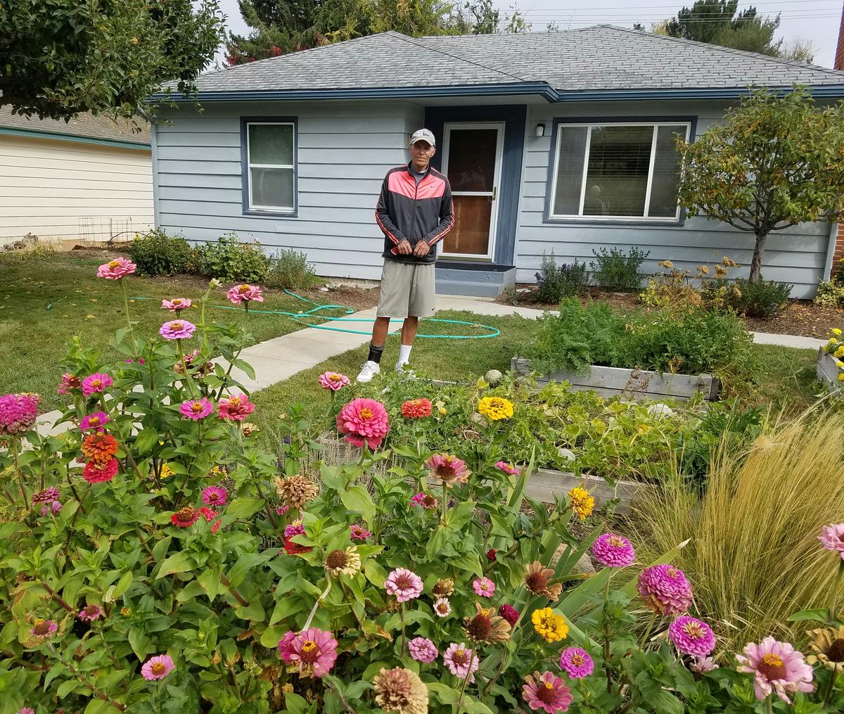 Tim Gleason and his wife, Chris, retired Boise schoolteachers, have worked to enhance their home on West Potter Drive, south of the Boise State University campus, by planting flowers, vegetables and fruit trees. They wish the university would save the four homes it plans to demolish down the street.