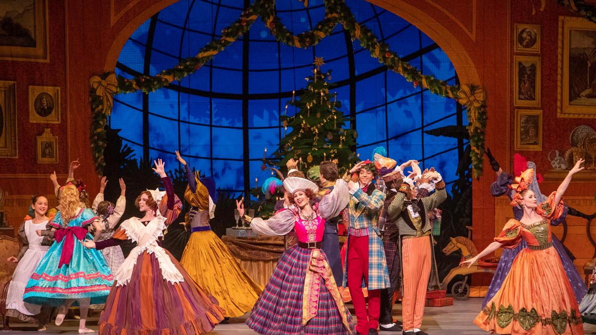 Partygoers dance at the Christmas party in Ballet Idaho’s new production of “The Nutcracker.” It opened Thursday, Dec. 19, to a full house.