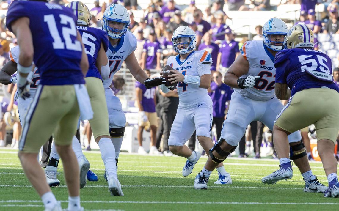 Boise State quarterback Maddux Madsen drops back after entering the game late in the fourth quarter.