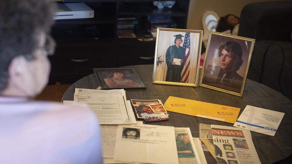 Looking at news clippings, flyers and photos, Sandra Bendele talks about her son, Richard Bendele, who was declared dead in 2003.