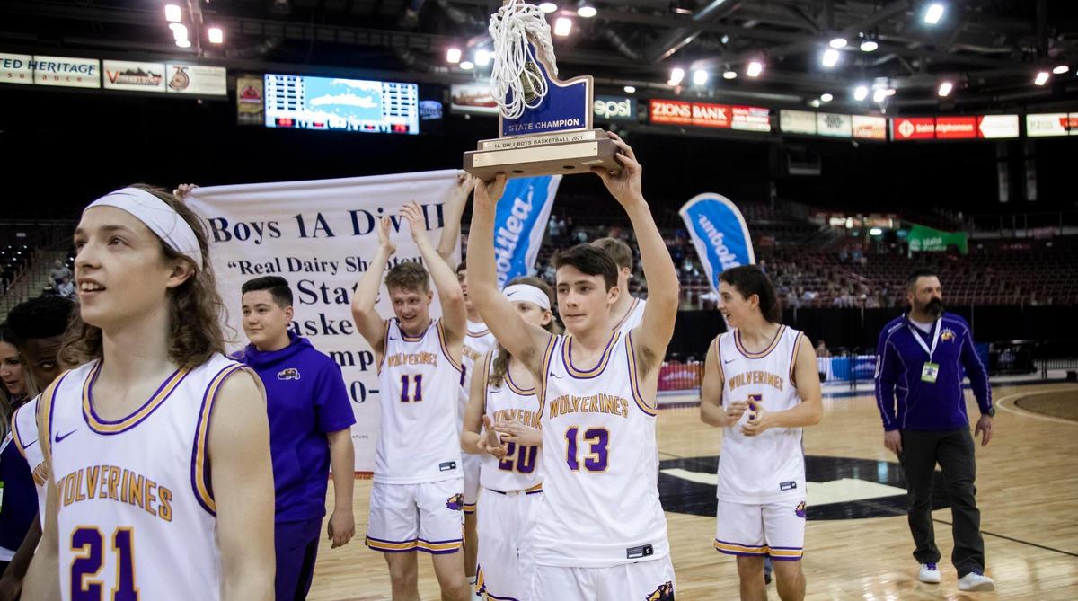 Garden Valley hoists the 1A Division II championship trophy in the air after defeating Dietrich 88-73 Friday, March 5, 2021 at Ford Idaho Center in Nampa.