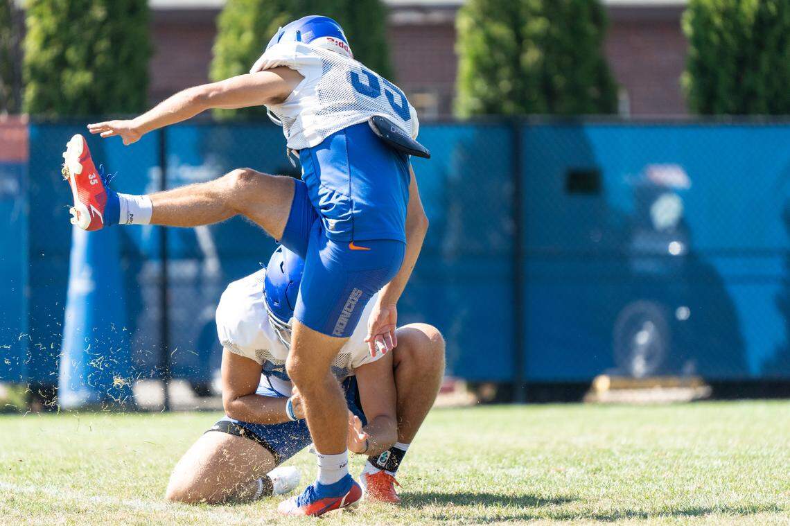 Boise State kicker Jonah Dalmas attempts a field goal during practice.