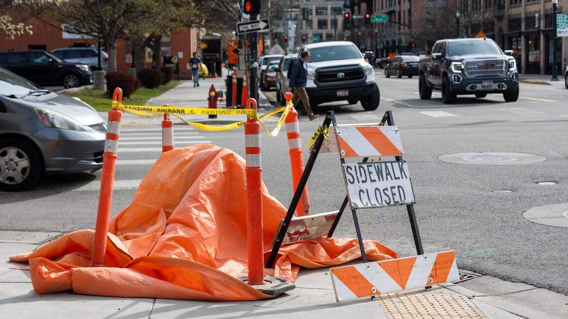 The sidewalk is closed at 10th Street and Idaho Street, Thursday, April 20, 2023. Several roads are closed in downtown Boise for infrastructure related to new construction of buildings as well as improvements to roads and sidewalks.