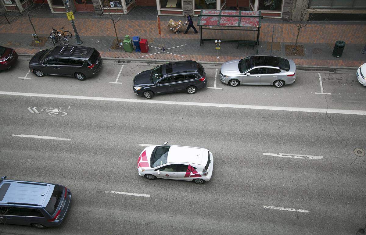 A car pulls into a parking spot along W. Front Street in downtown Boise, Idaho.